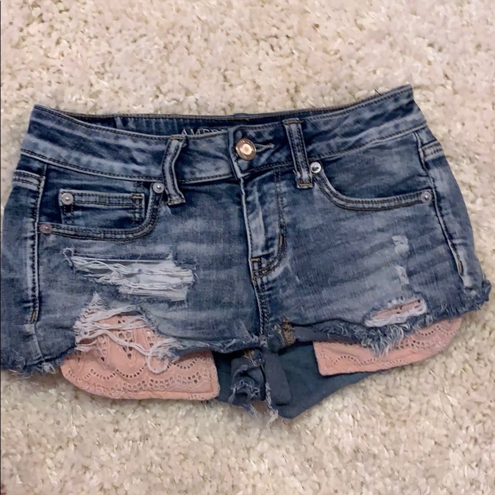 American Eagle jean shorts with pink pocket detail